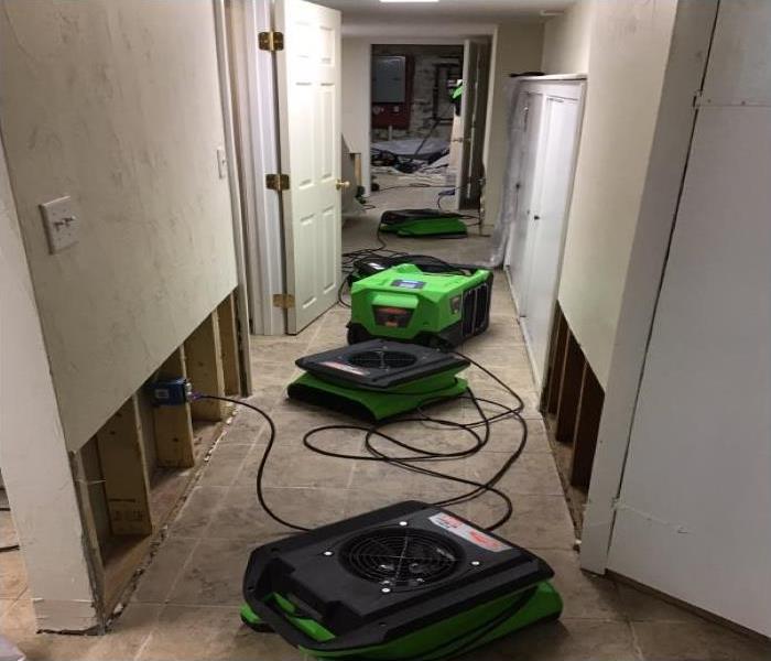 equipment placed in hallway for drying water damage
