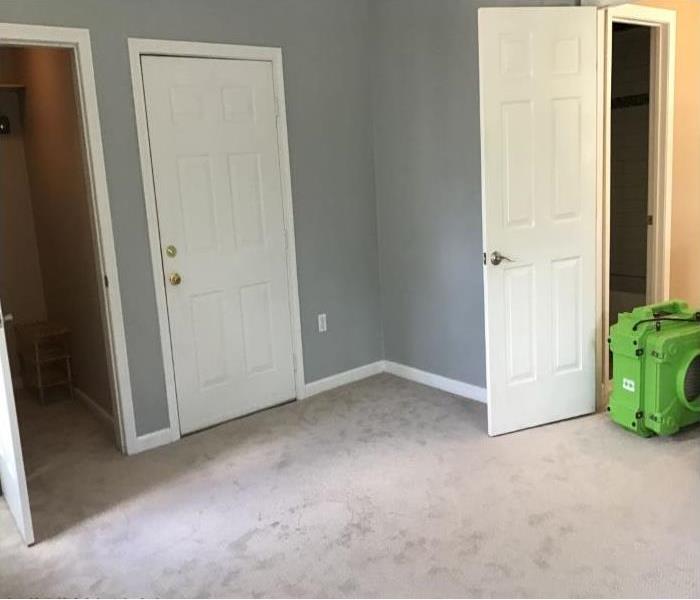 image of room with air scrubber and clean carpets