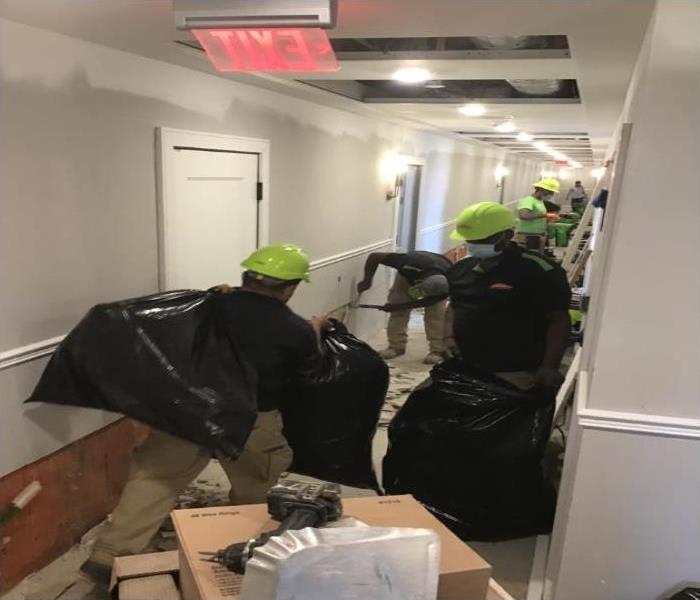 Technicians working in commercial building