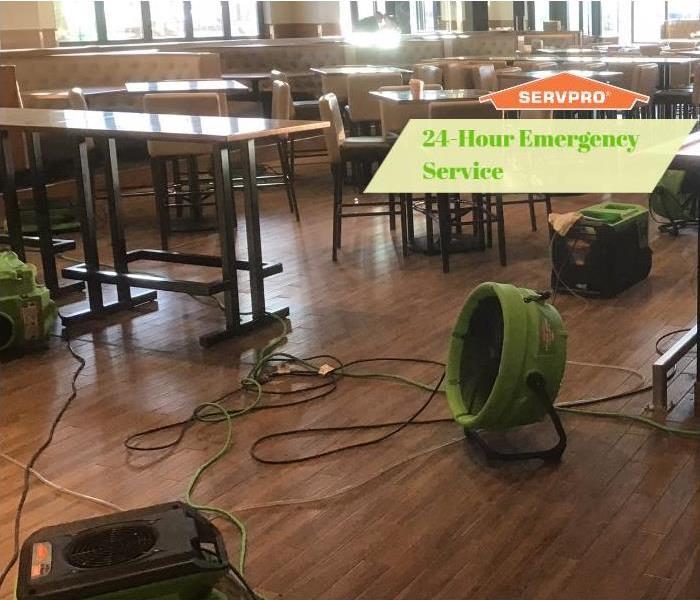 green air mover and dehumidifers placed in restaurant