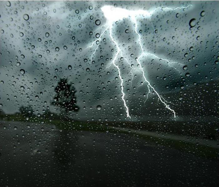 lightning striking during night time